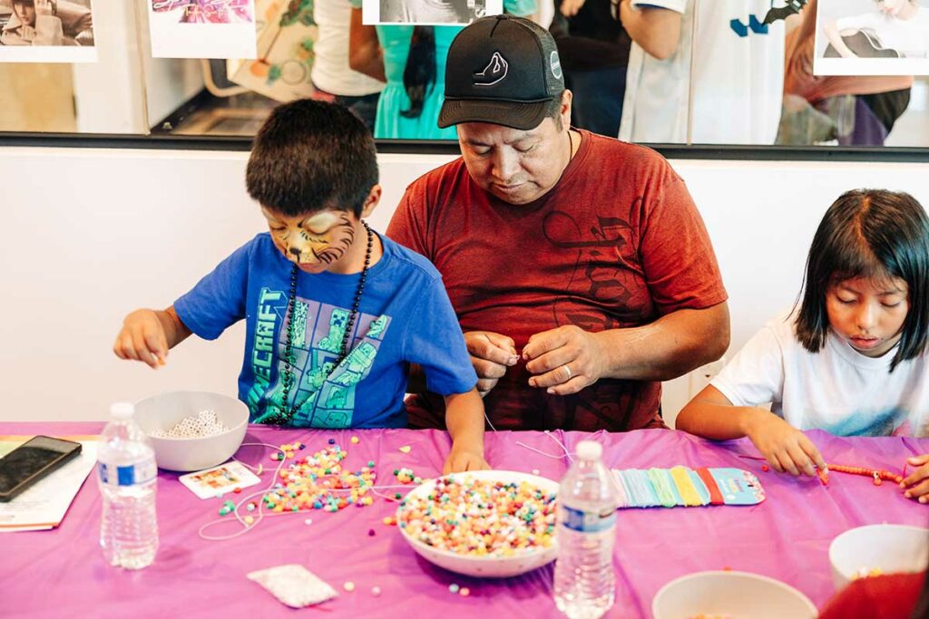 enjoying crafts at ICANHalloween festival