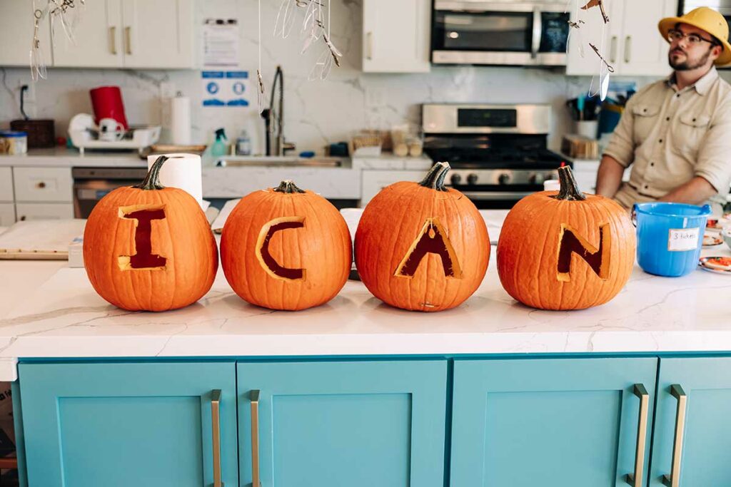 pumpkins carved with ICAN letters