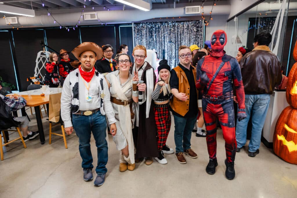 Clients and staff in costume at ICAN Halloween fest 2024